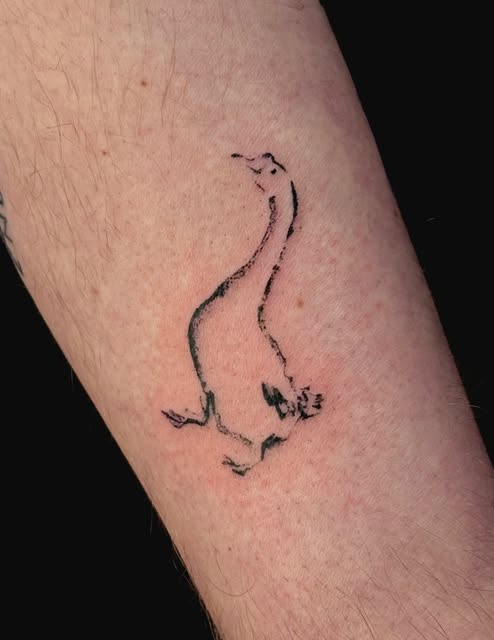 Goose tattoo on forearm